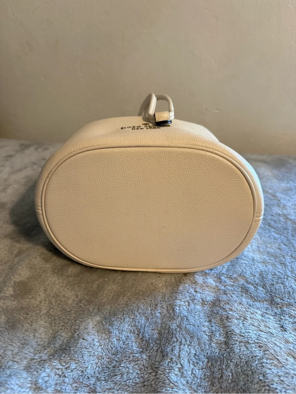 kate spade Cream Pebble Leather Drawstring Bucket Bag with Striped Strap